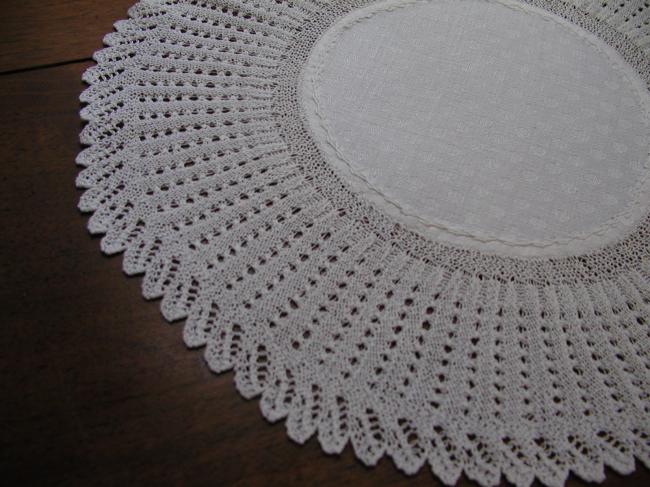 Charming round damask doily with knitted lace