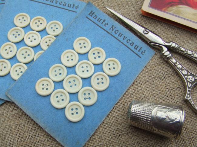 Jolie carte de 12 petits boutons ronds en celluloïd 'Haute Nouveauté' 1920