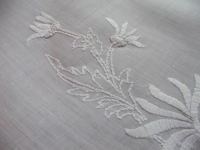 So lovely irish linen tablecloth with large embroidered knapweed flowers