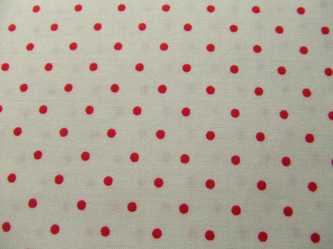 Coupon de coton à fond écru avec impression de petits pois couleur rouge