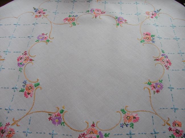 Really pretty tablecloth with lots of embroidered flowers