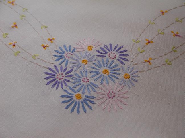 Lovely tablecloth with floral embroidery in blue colors