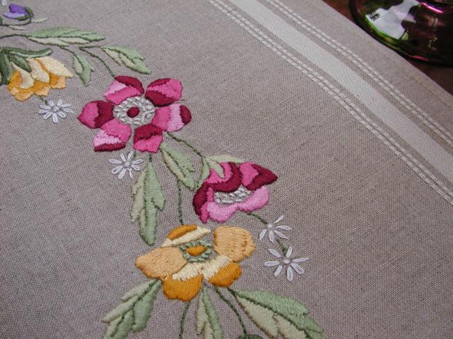 Very attractive tablecloth with a lovely hand made embroidered crown of flowers