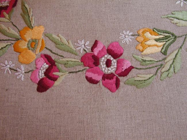 Very attractive tablecloth with a lovely hand made embroidered crown of flowers