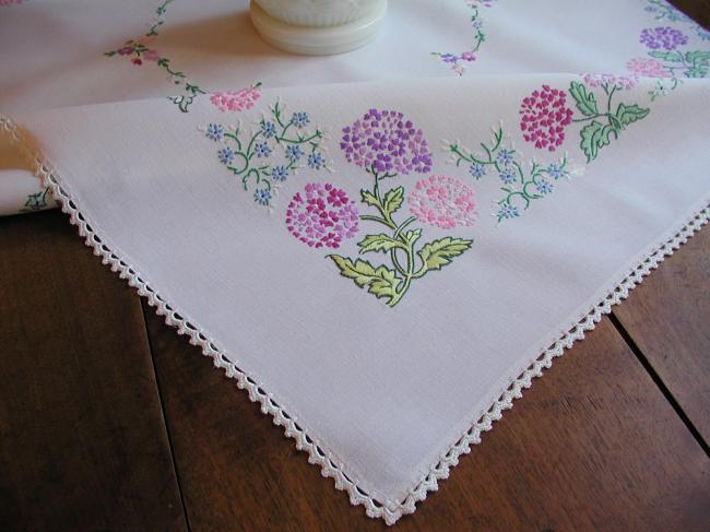 Breathtaking tablecloth with hand-embroidered  bouquets of verbena flowers