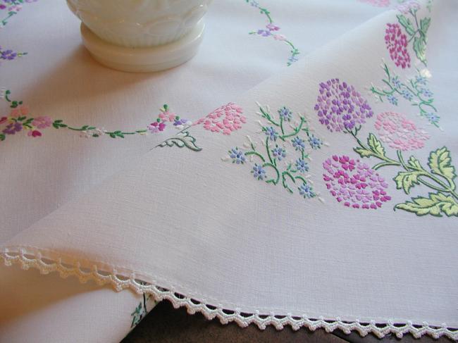 Breathtaking tablecloth with hand-embroidered  bouquets of verbena flowers