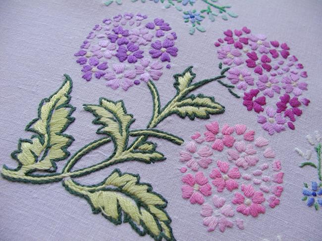 Breathtaking tablecloth with hand-embroidered  bouquets of verbena flowers