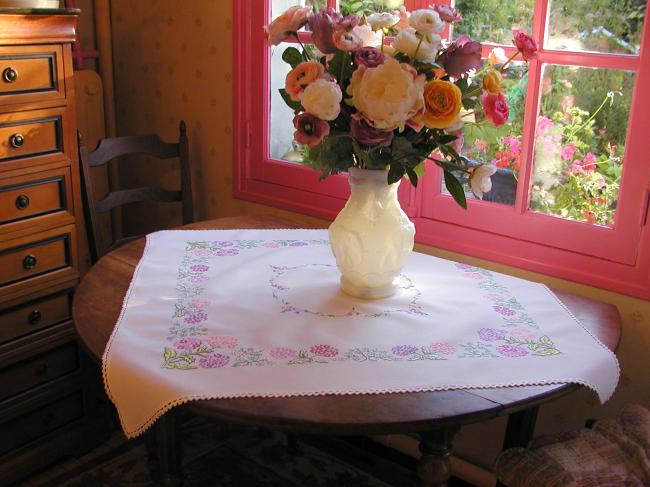 Breathtaking tablecloth with hand-embroidered  bouquets of verbena flowers