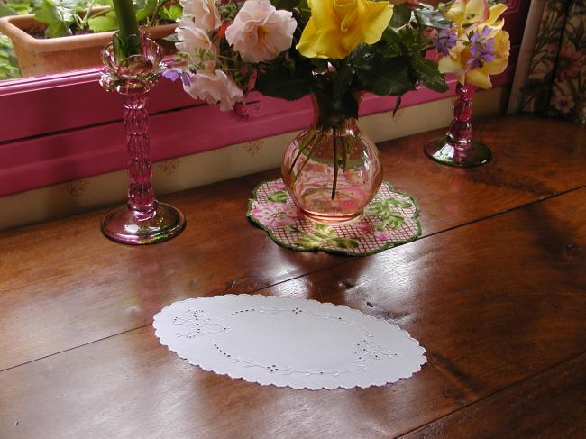 So charming oval doily with an embroidered butterfly and basket of flowers