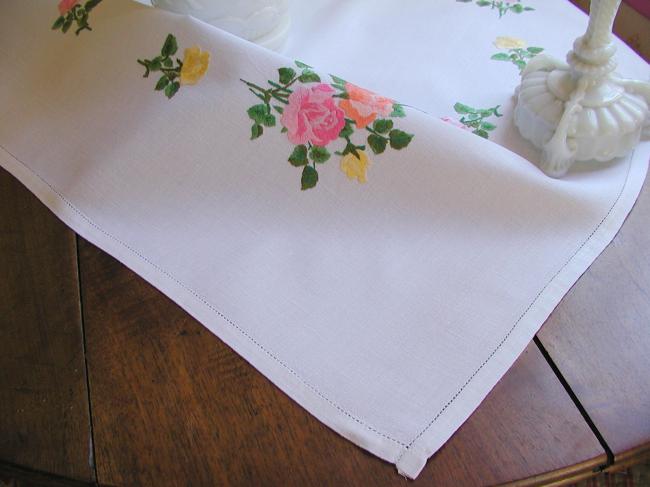 Sweet  tablecloth with hand-embroidered red, orange and pink roses