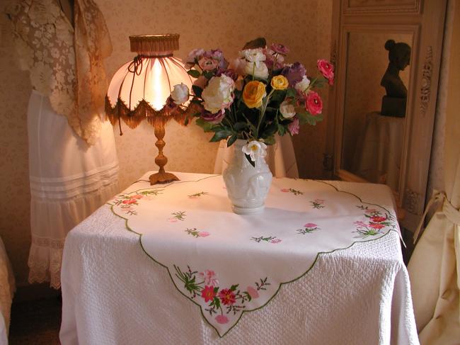 So adorable tablecloth with hand-embroidered bunches of flowers