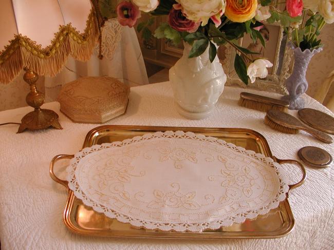 Lovely table centre with hand-embroidered stylish flowers and bobbin lace