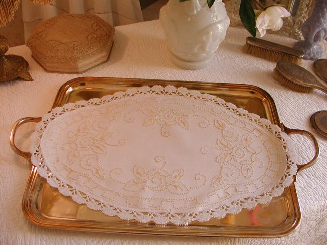 Lovely table centre with hand-embroidered stylish flowers and bobbin lace