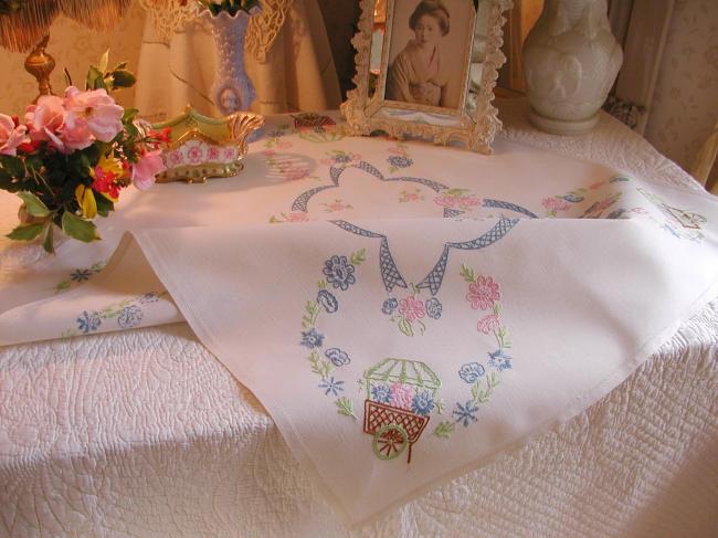 Lovely tablecloth with hand-embroidered flowers and little carriages