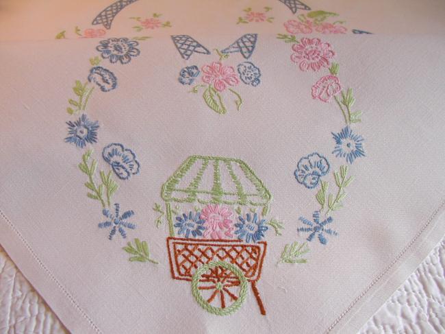 Lovely tablecloth with hand-embroidered flowers and little carriages