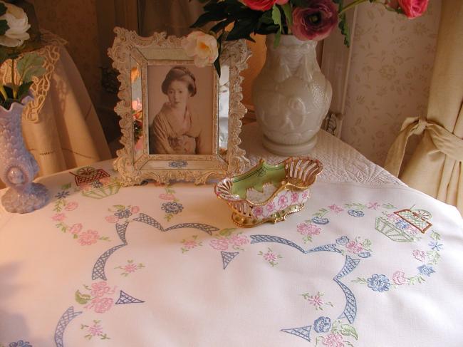 Lovely tablecloth with hand-embroidered flowers and little carriages