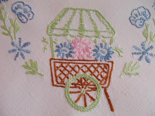 Lovely tablecloth with hand-embroidered flowers and little carriages