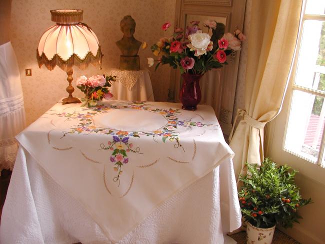 Spectacular tablecloth with hand-embroidered crown of flowers 1950