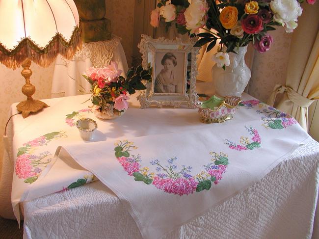 Sweet spring tablecloth with embroidered flowers like blue bells,primula, etc..