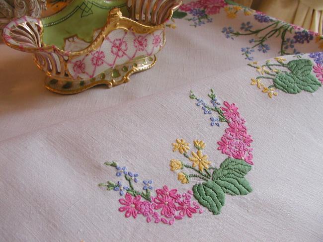 Sweet spring tablecloth with embroidered flowers like blue bells,primula, etc..