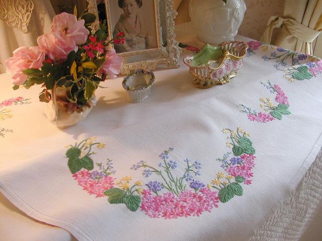 Sweet spring tablecloth with embroidered flowers like blue bells,primula, etc..