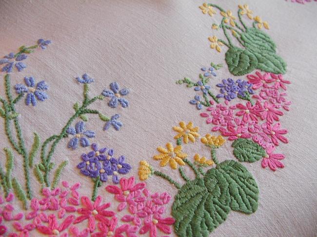 Sweet spring tablecloth with embroidered flowers like blue bells,primula, etc..