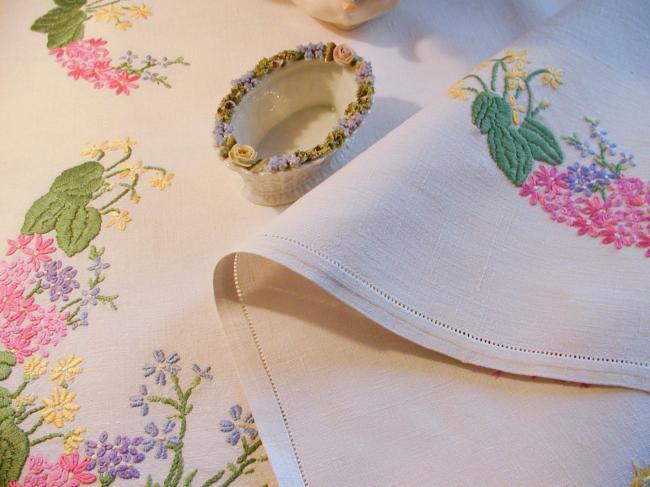 Sweet spring tablecloth with embroidered flowers like blue bells,primula, etc..