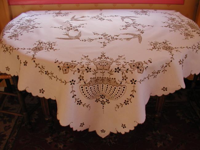 Exceptionel tablecloth in Madeira embroidery with urns,birds, blooming appletree