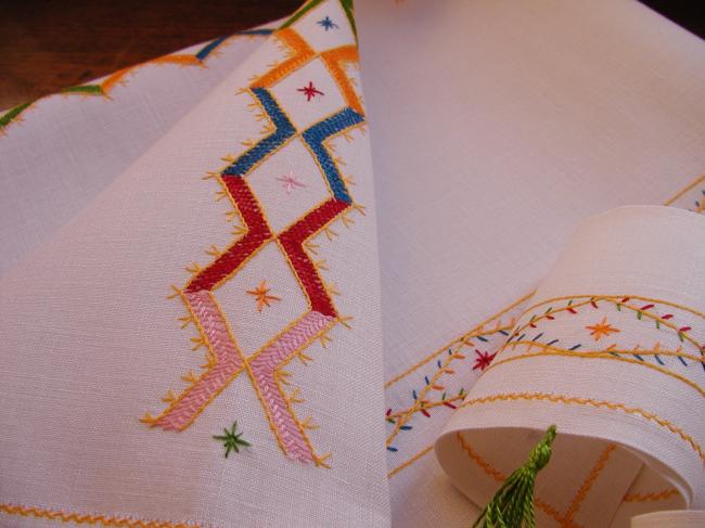 So beautiful tea tablecloth with its 6 matching napkins,colourful cross stitches