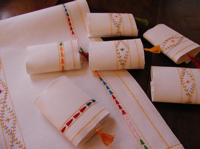 So beautiful tea tablecloth with its 6 matching napkins,colourful cross stitches