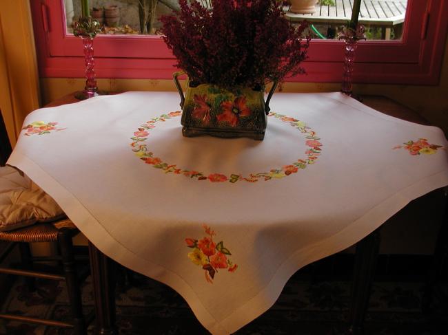 Really striking tablecloth with hand-embroidered nasturtium flowers