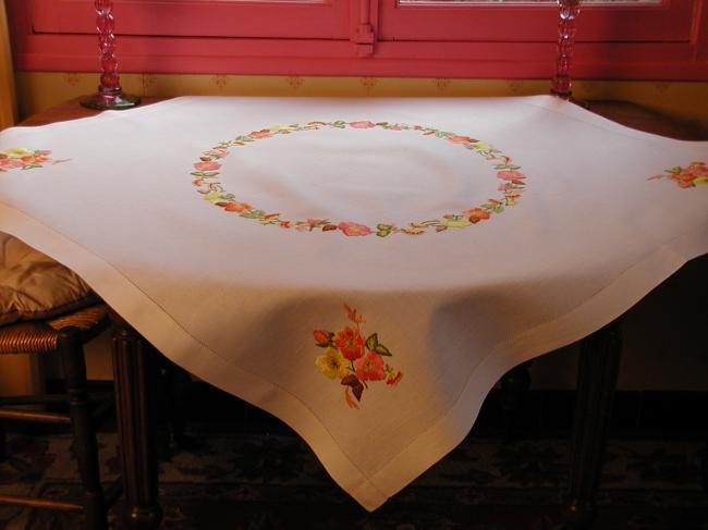 Really striking tablecloth with hand-embroidered nasturtium flowers