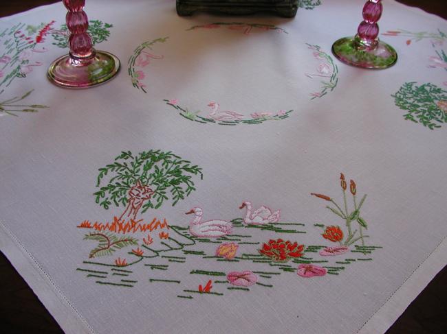 Gorgeous small tablecloth with hand-embroidered scene of swans on water