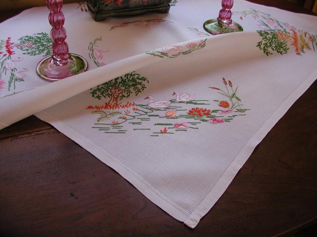 Gorgeous small tablecloth with hand-embroidered scene of swans on water