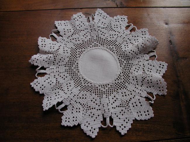 Stunning round doily with crochet lace depicting butterflies