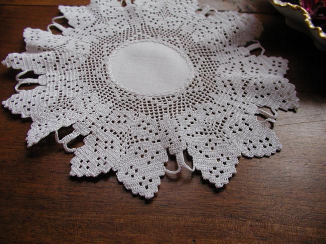 Stunning round doily with crochet lace depicting butterflies