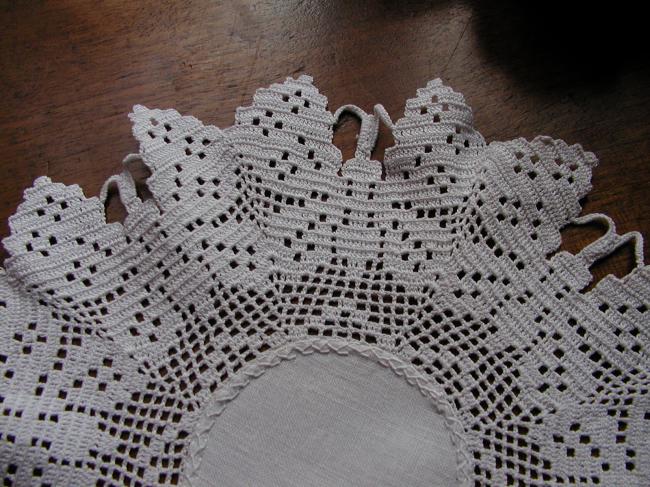 Stunning round doily with crochet lace depicting butterflies