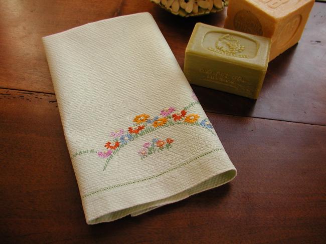 Lovely green hand towel with embroidered flowers