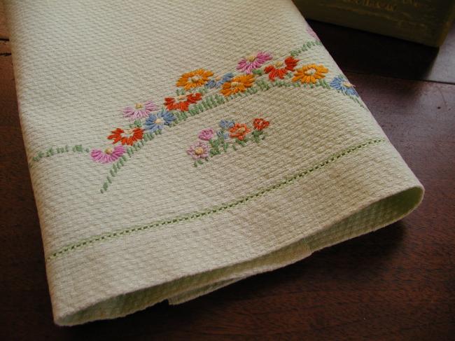 Lovely green hand towel with embroidered flowers