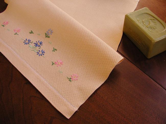 Lovely yellow waffle hand towel with embroidered flowers