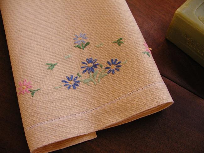 Lovely yellow waffle hand towel with embroidered flowers