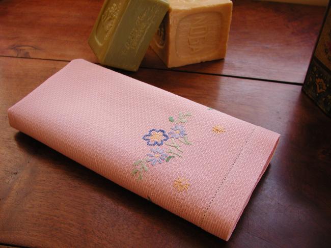 Gracious  pink hand towel with embroidered flowers