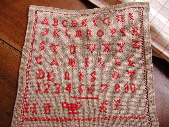 Superb sampler in hemp with red cross stitches, made by Camille Denisot 1920-30