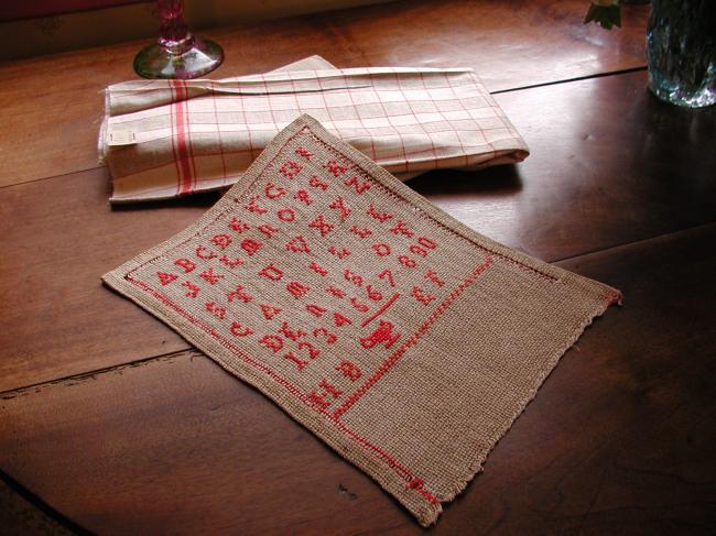 Superb sampler in hemp with red cross stitches, made by Camille Denisot 1920-30