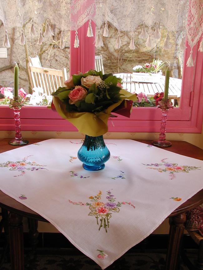 Lovely small tablecloth with hand-embroidered bouquets of flowers