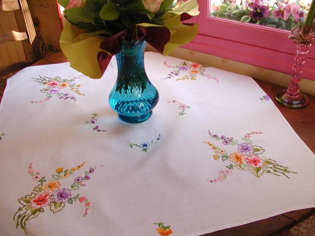 Lovely small tablecloth with hand-embroidered bouquets of flowers