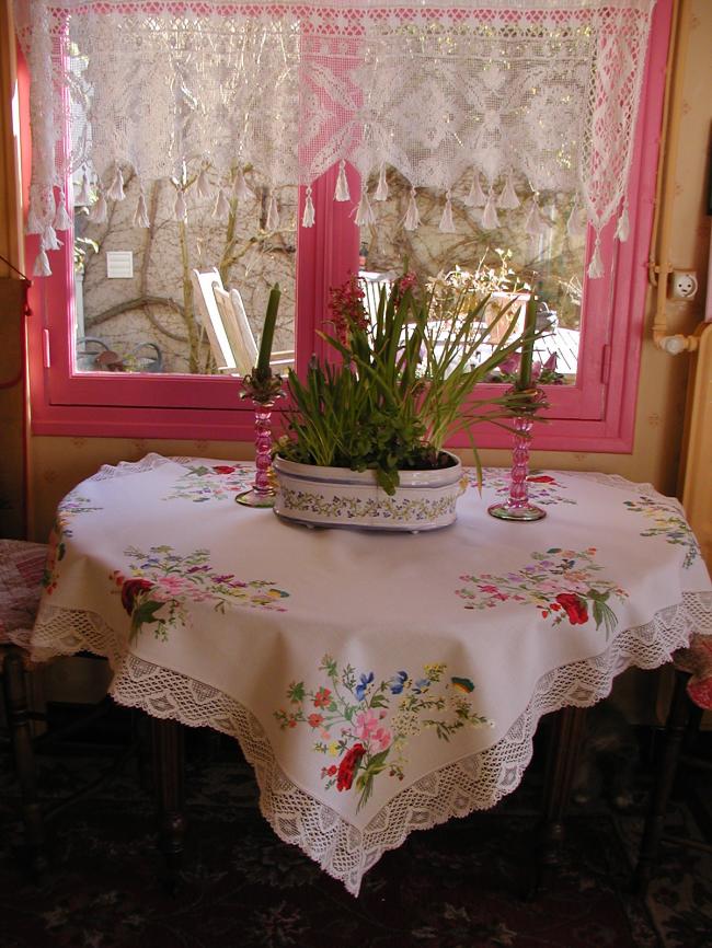 Really breathtaking tablecloth with hand-embroidered flowers and butterflies