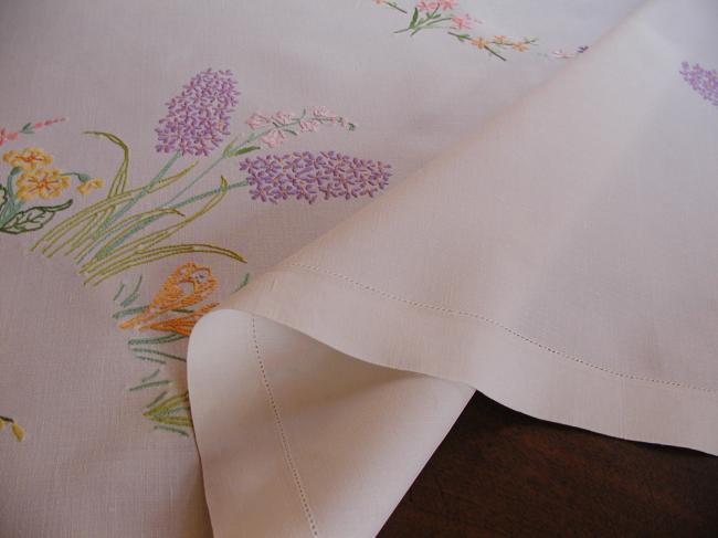 Lovely tablecloth with hand-embroidered hyacinths, crocus and spring flowers