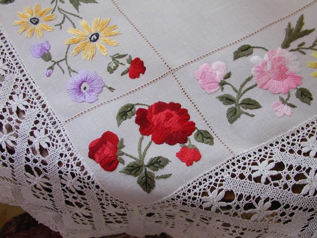 Really romantic tablecloth with hand-embroidered flowers and lace edging