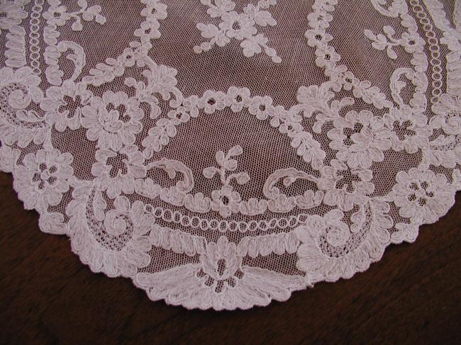 Stunning doily in net lace with needle run embroidered flowers 1900